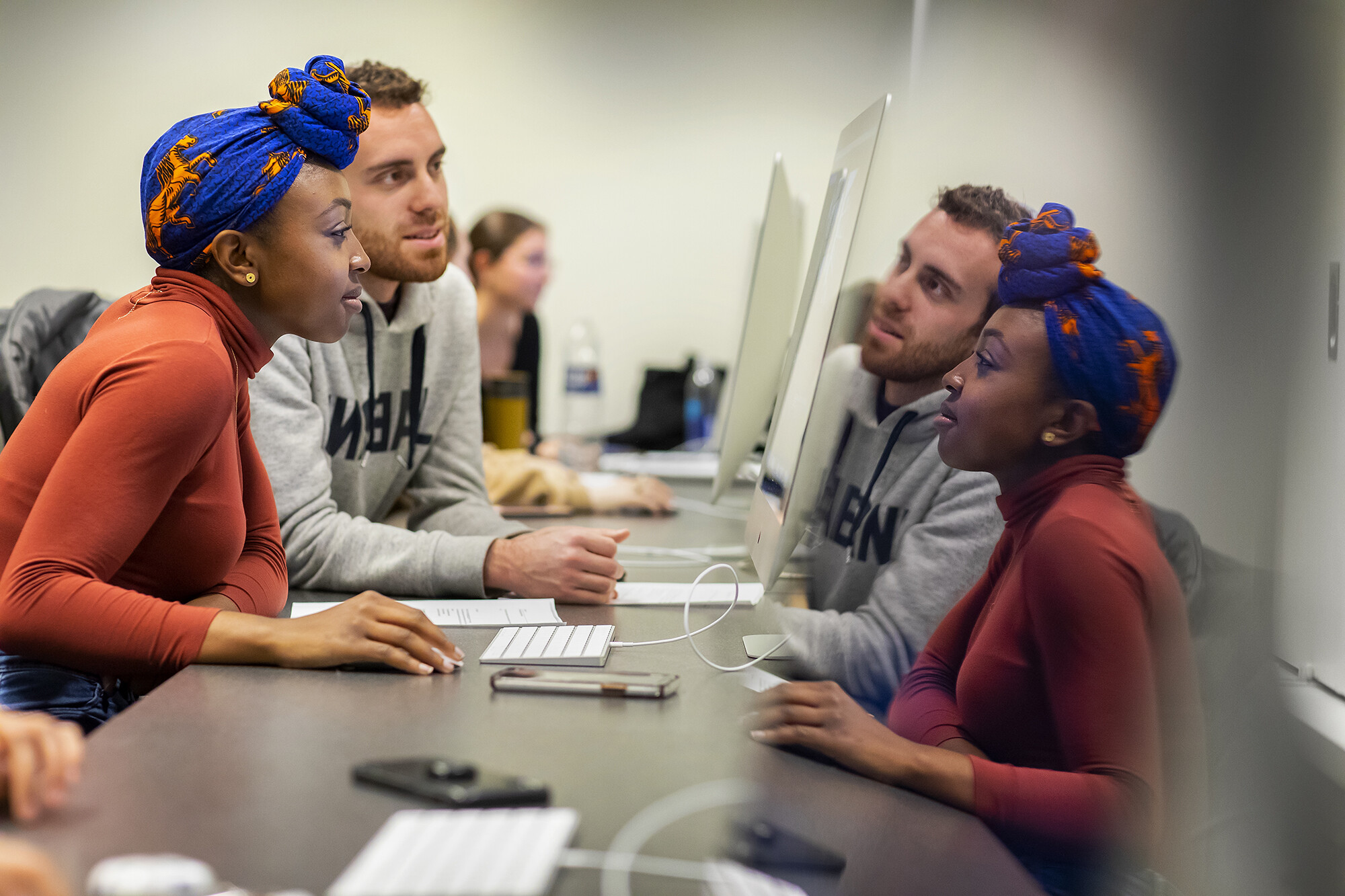 students editing video in jacksons hbo class